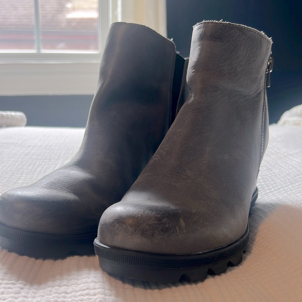 Grey sorel wedge booties with zippers